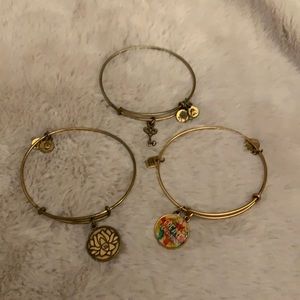 Alex and Ani Gold tone 3-pack. Key to tranquility